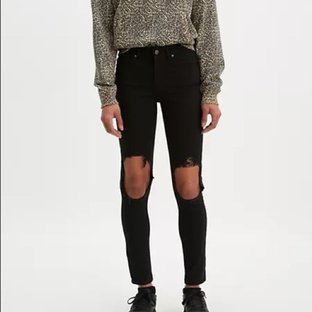 721 black Levi high rise skinny distressed jeans